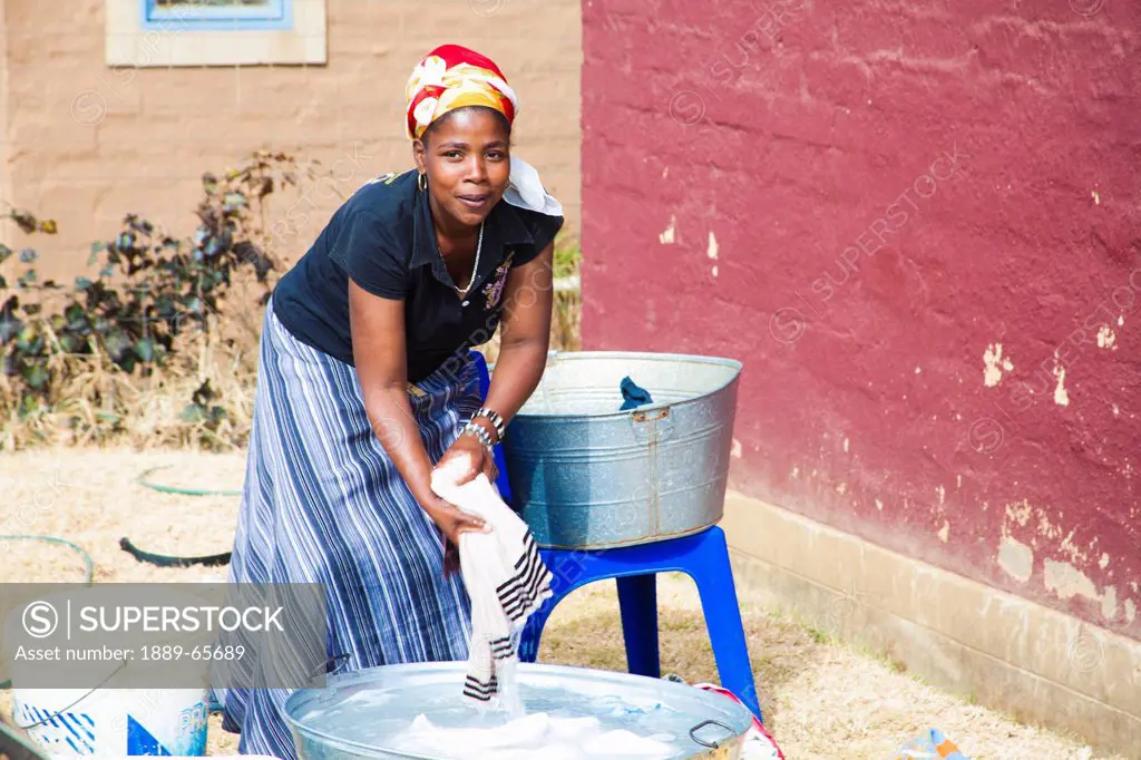 Ugandan Woman Doing Her Laundry, Kampala Uganda Africa