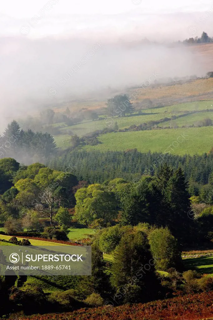 fog rolling into nire valley, clonmel, county tipperary, ireland