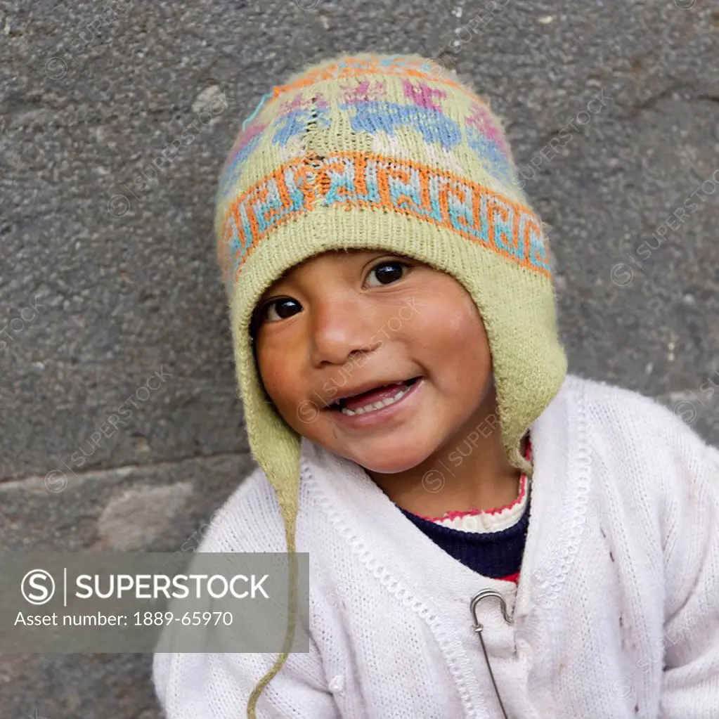 Portrait Of A Young Boy Wearing A Hat, Cusco Peru