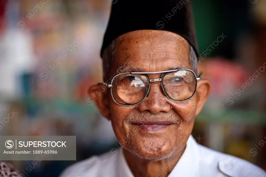 A Muslim Man Wearing A Prayer Hat, Muara Pinang Sumatera Selatan Indonesia