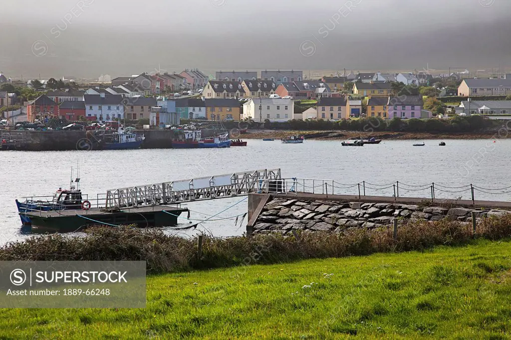 view of the town along a river, portmagee county kerry ireland