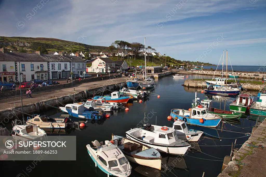 boats in carnlough harbor, county antrim ireland