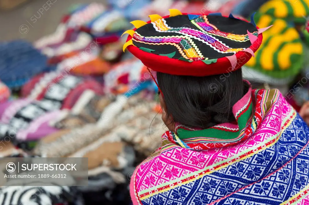 colorful fabric at craft market in plaza regocijo, cusco peru