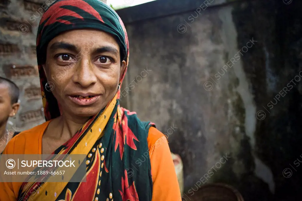 A Woman Wearing A Headscarf In The Slums, Sylhet, Bangladesh