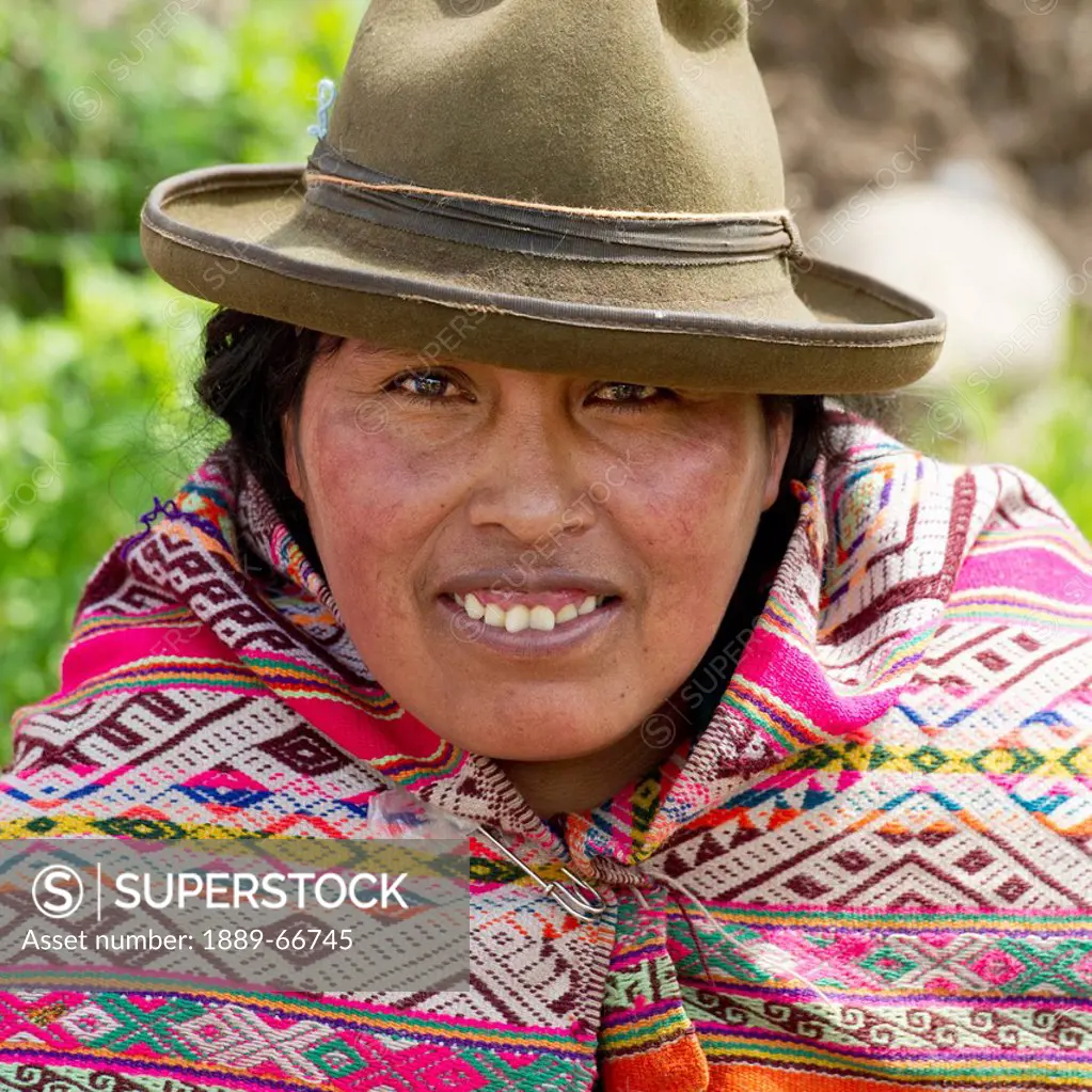 Portrait Of A Woman Wearing A Hat And Colorful Scarf, Peru