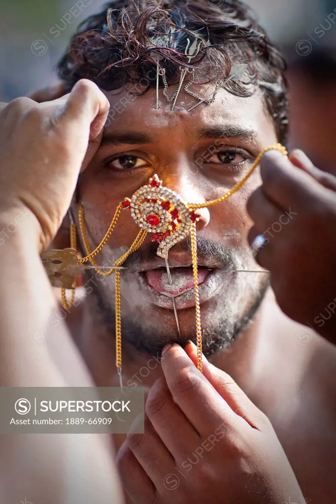 A Young Man In A Ritual Of Tongue Piercing, India