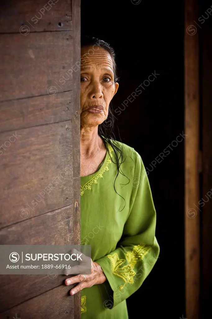 Portrait Of A Woman Wearing A Green Dress, Indonesia