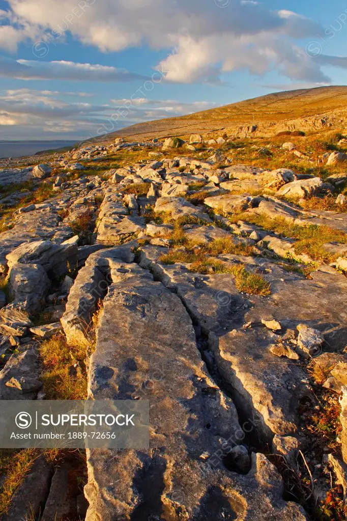 rocks among the grass in the burren region, county clare ireland