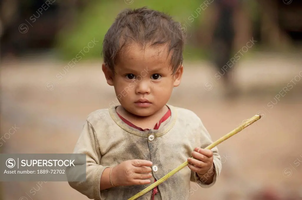 a young child at the noh poh refugee camp, noh poh mae sot chiang mai thailand