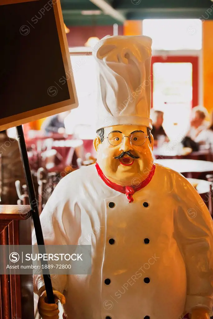 chef figure holding sign for daily specials, st. albert, alberta, canada