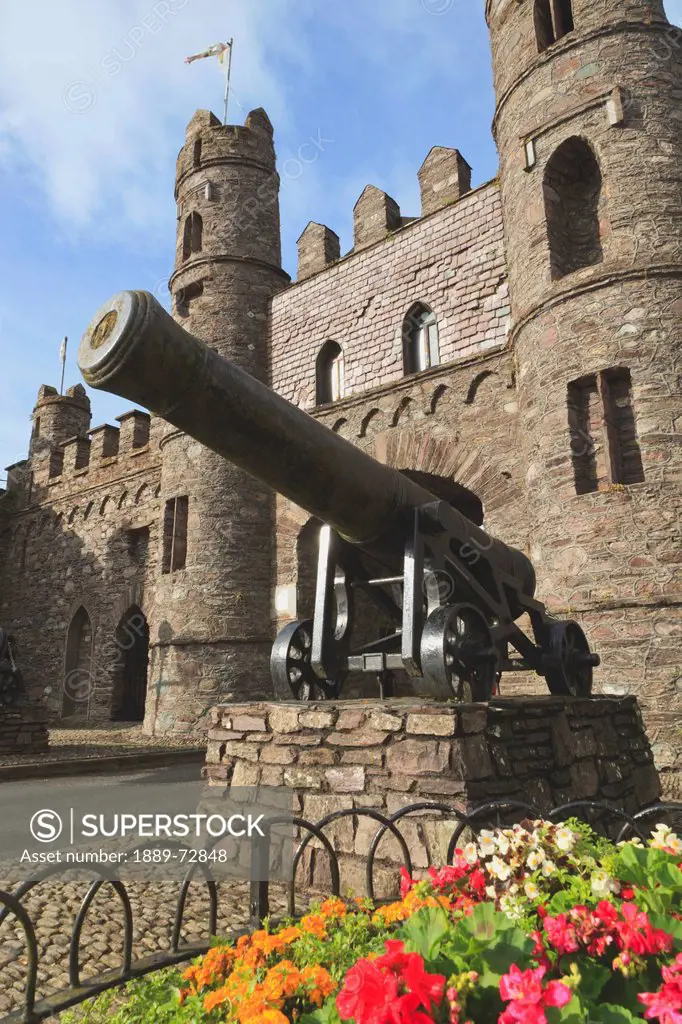 cannon mounted outside archway of macroom castle, macroom county cork republic of ireland