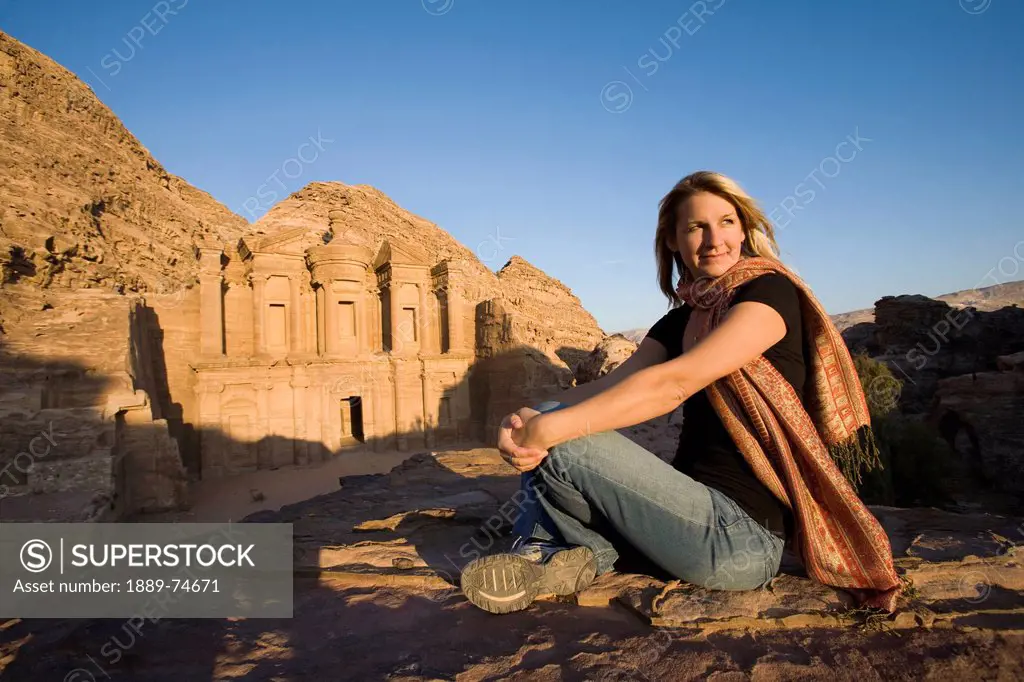 A Woman Tourist Visits The Nabatean Ruins Of The Monastery, Petra Jordan