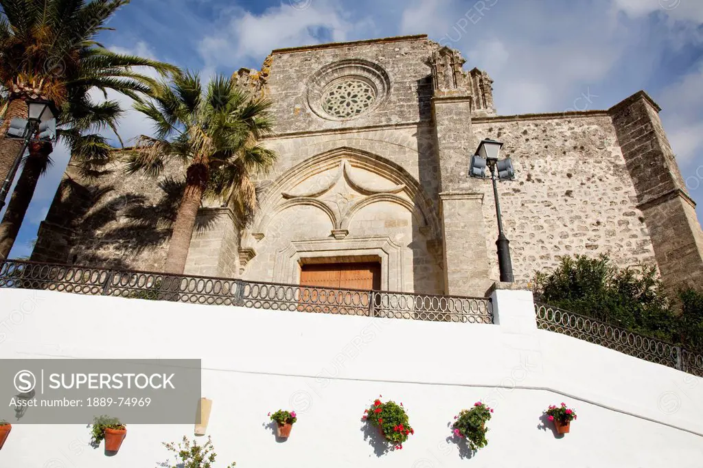 Low angle view of the front entrance of a building, vejer de la frontera andalusia spain