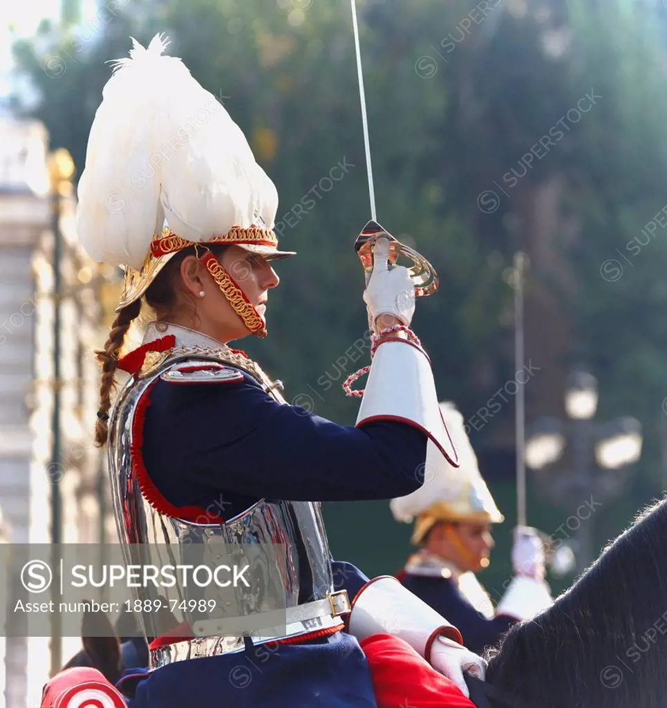 Female cuirassier of the royal guard in traditional uniform, madrid spain