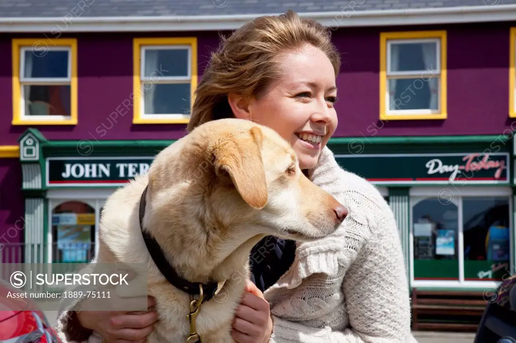 A woman with her golden retriever, allihies county cork ireland