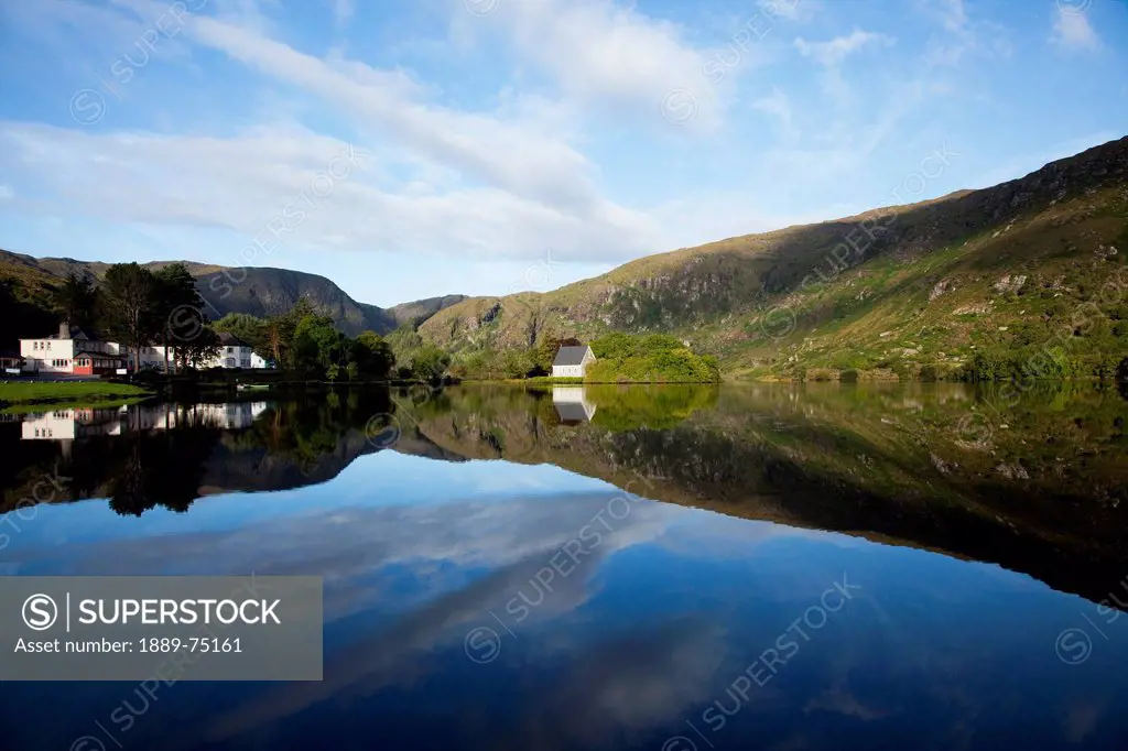 The church and hotel along the water´s edge of the lake, gougane barra county cork ireland