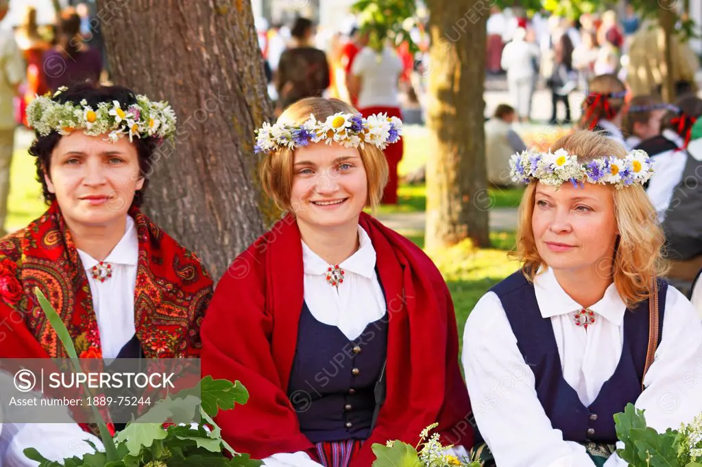 Three Women Dressed For Midsummer´s Eve Festival, Jurmala Latvia