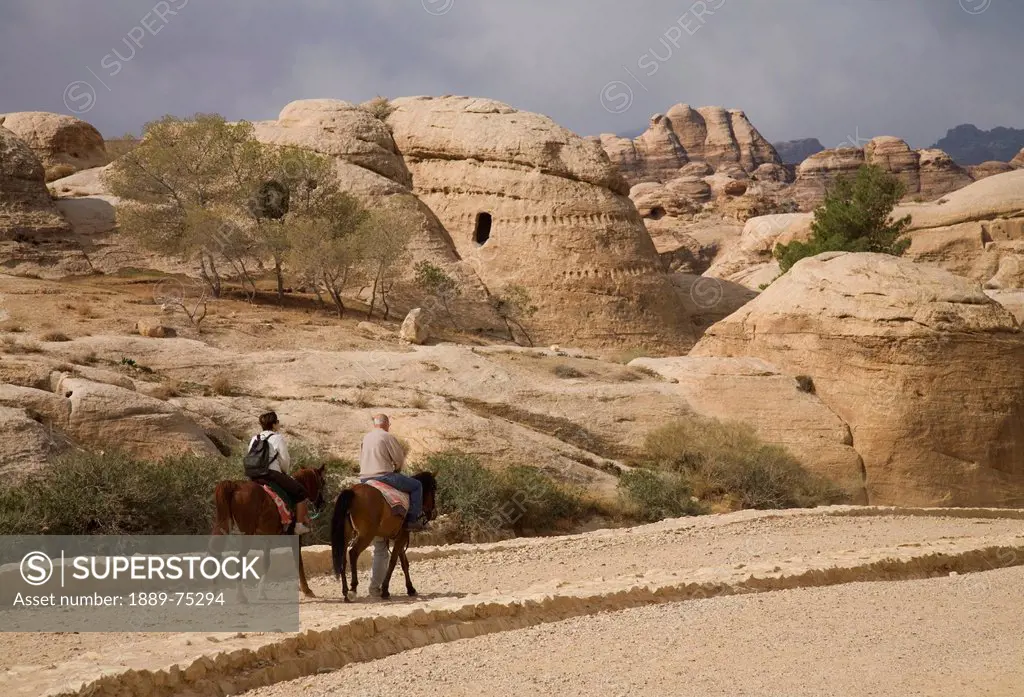 Tourists Ride On Horses To Explore, Petra Jordan