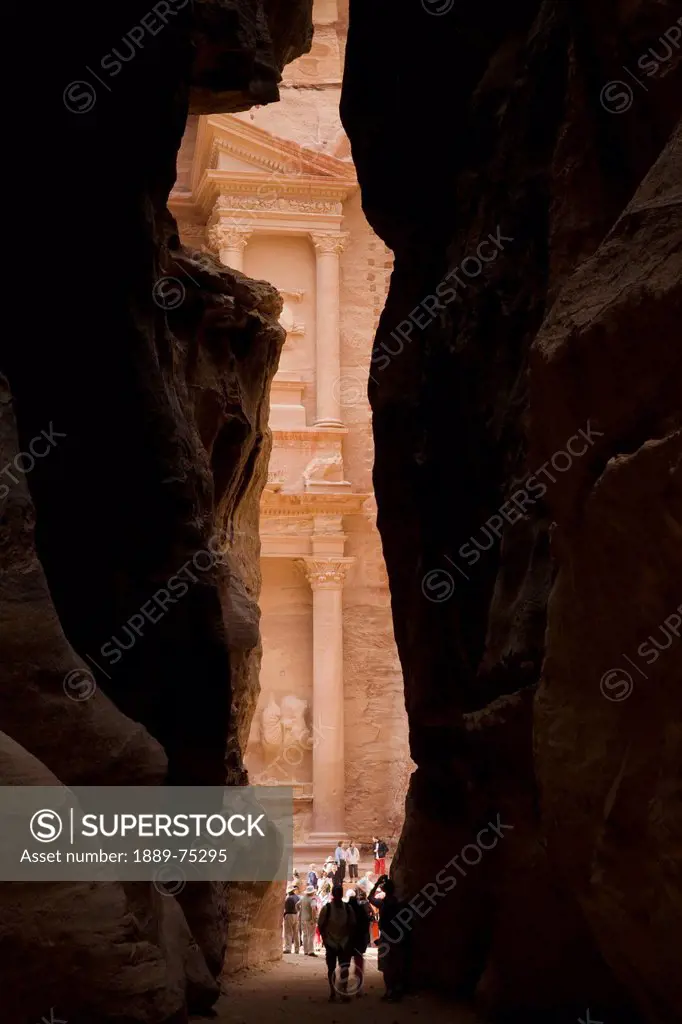 Tourists Visit The Treasury In The Nabatean City, Petra Jordan
