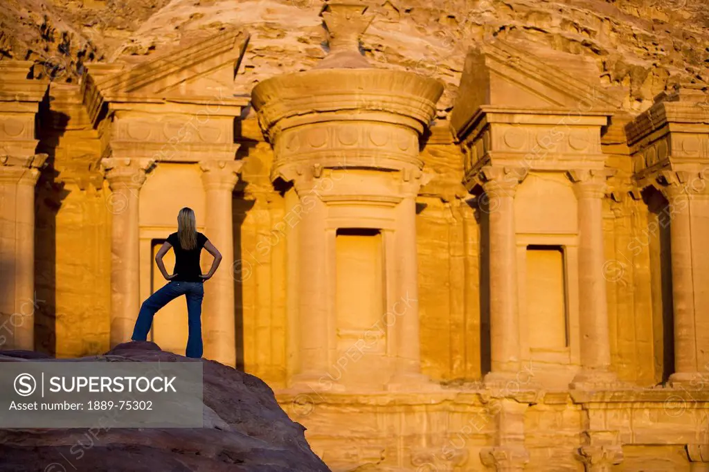 A Woman Tourist Visits The Nabatean Ruins Of The Monastery, Petra Jordan