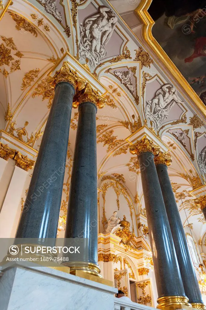 Columns and ornate walls inside winter palace, st. petersburg russia