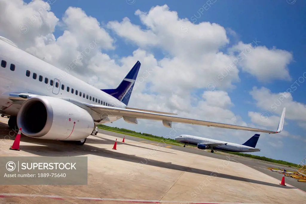 Airplanes sitting on the tarmac, punta cana la altagracia dominican republic