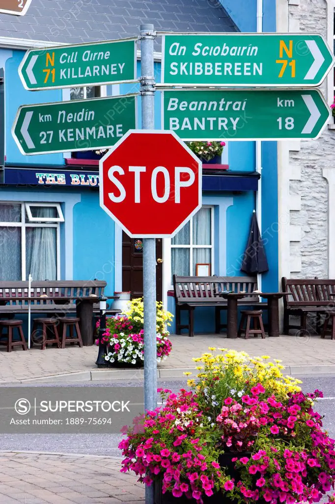 Direction And Destination Signs On A Stop Sign Post, Glengarriff County Cork Ireland