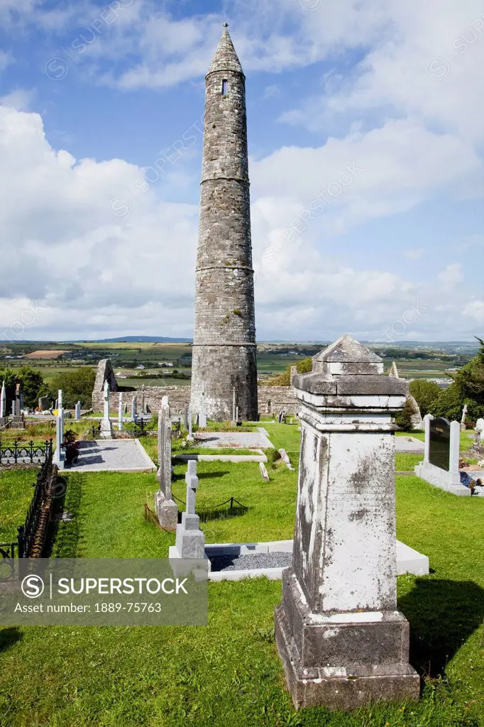 The roundtower and cemetery at the cathedral, ardmore county waterford ireland