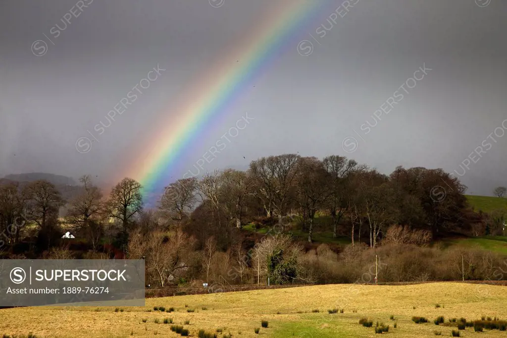 A rainbow against storm clouds, dumfries scotland