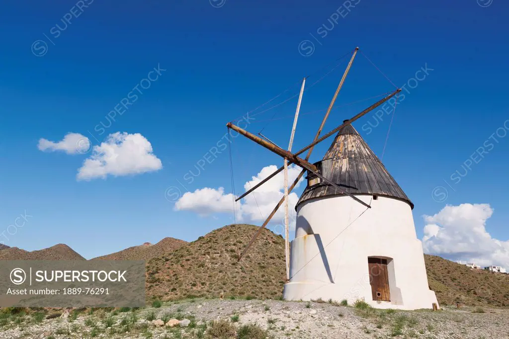 Windmill just outside san jose in cabo de gata_nijar natural park, almeria province spain