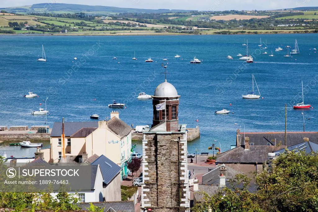 A town along the coast and boats in the harbour, youghal county cork ireland