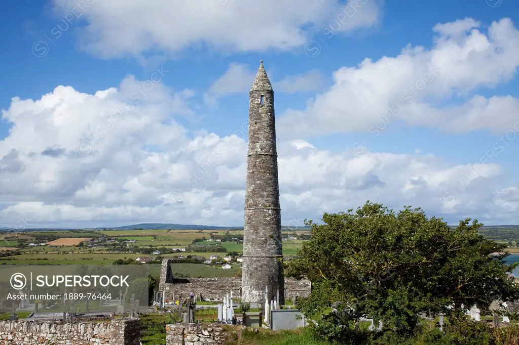 The roundtower and cemetery at the cathedral, ardmore county waterford ireland