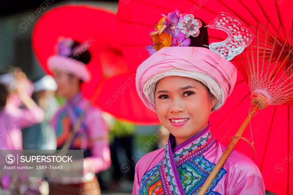 A Young Woman Dressed For The Chiang Mai Flower Festival Parade, Chiang Mai Thailand