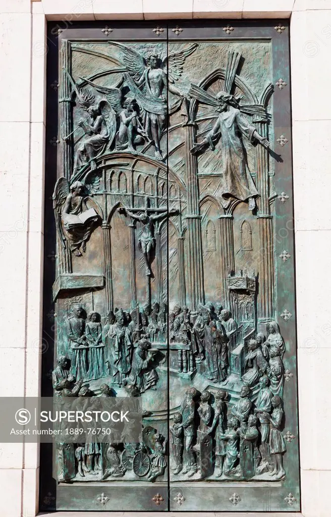 Bronze doors to the cathedral of our lady of almudena, madrid spain