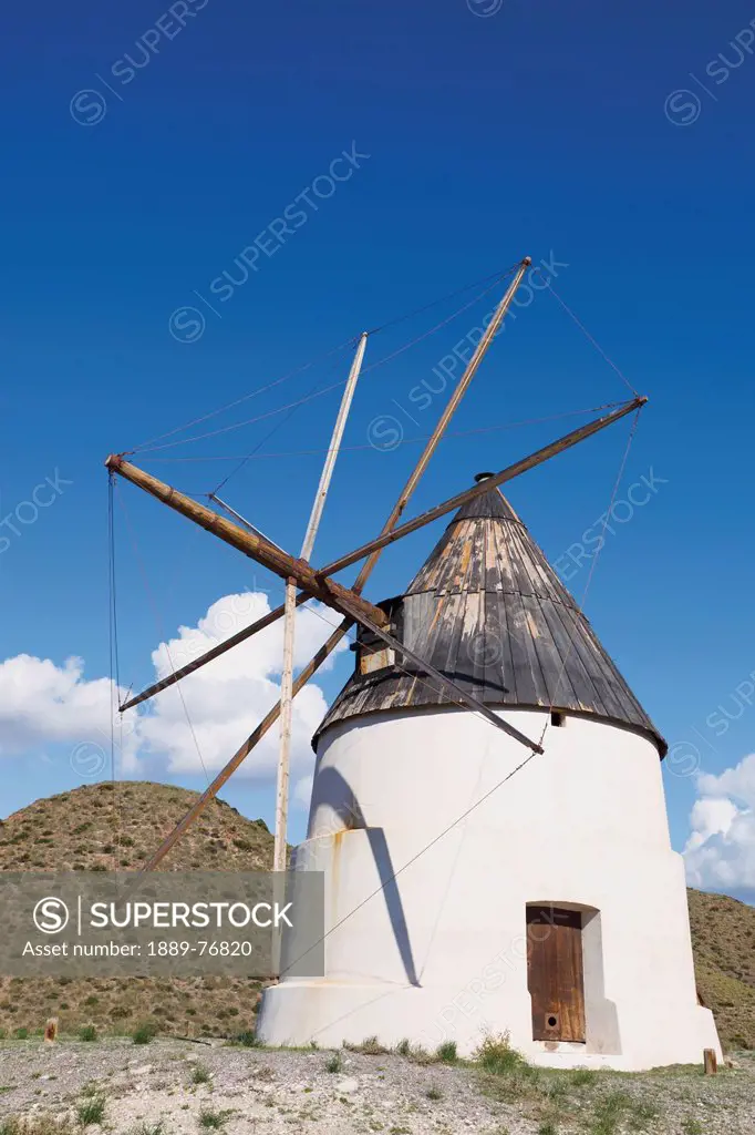 Windmill just outside san jose in cabo de gata_nijar natural park, almeria province spain