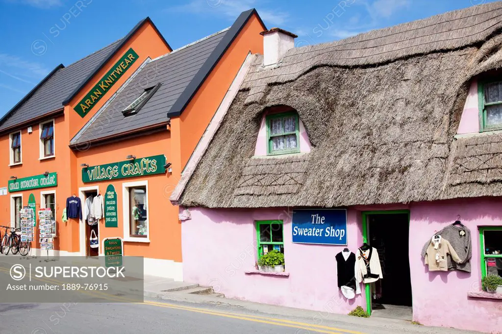 Colourful buildings housing the sweater shop and aran knitwear, doolin county clare ireland