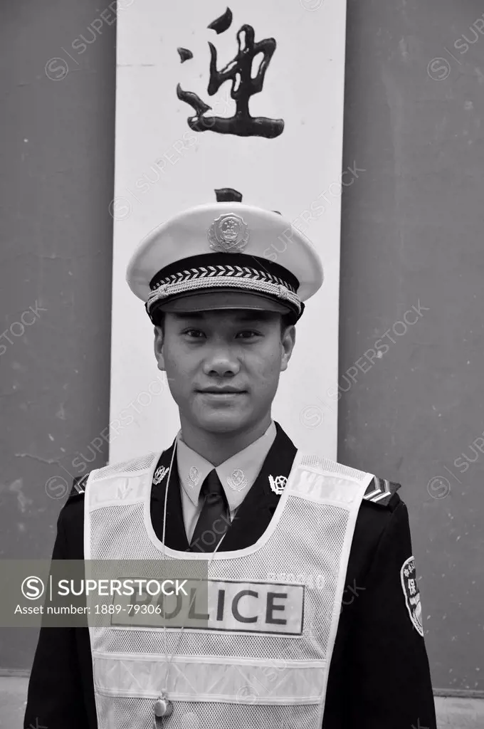 a young police officer, ruili yunnan china