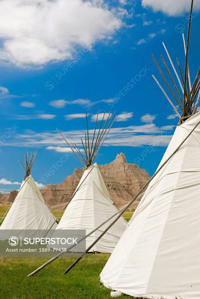 three teepees in badlands national park, south dakota united states of america