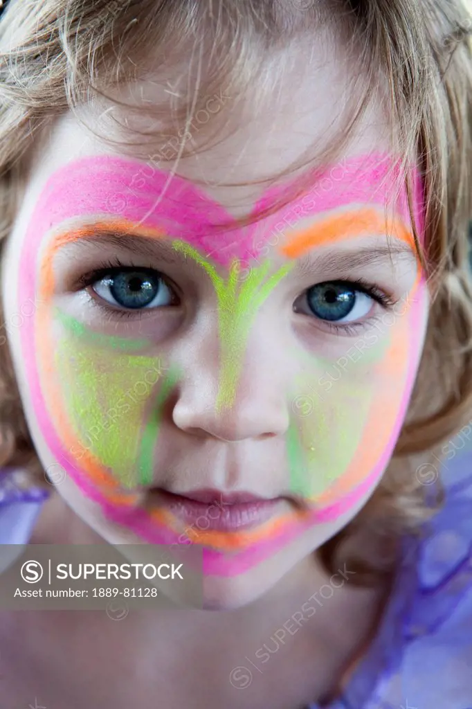 A young girl with her face painted, gold coast queensland australia