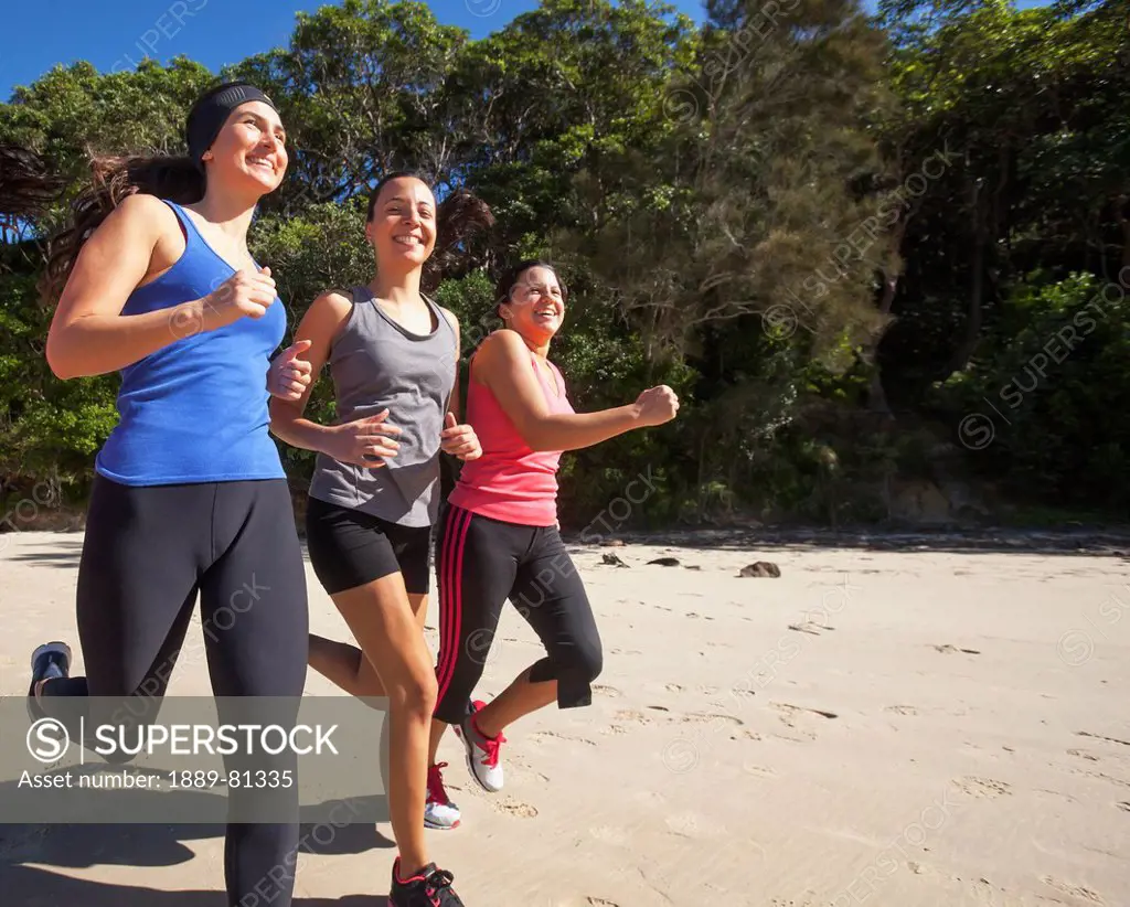 Three women running, gold coast queensland australia