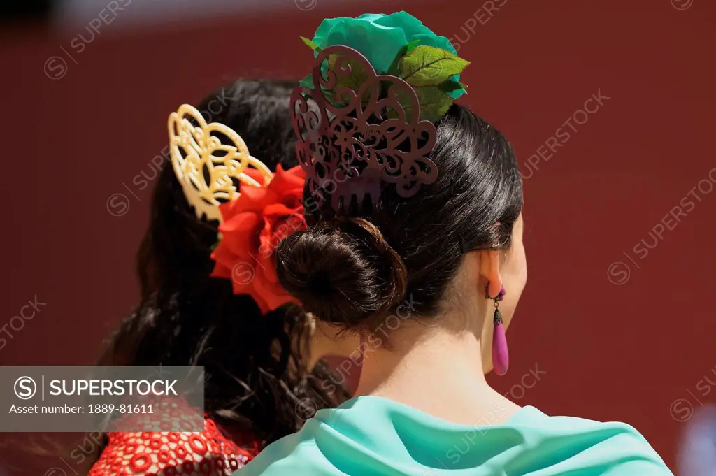 Woman with decorated hairstyles for the april fair, seville andalusia spain