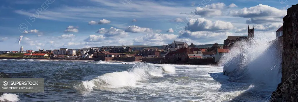 Waves crashing against a wall on the shore, dunbar scottish borders scotland