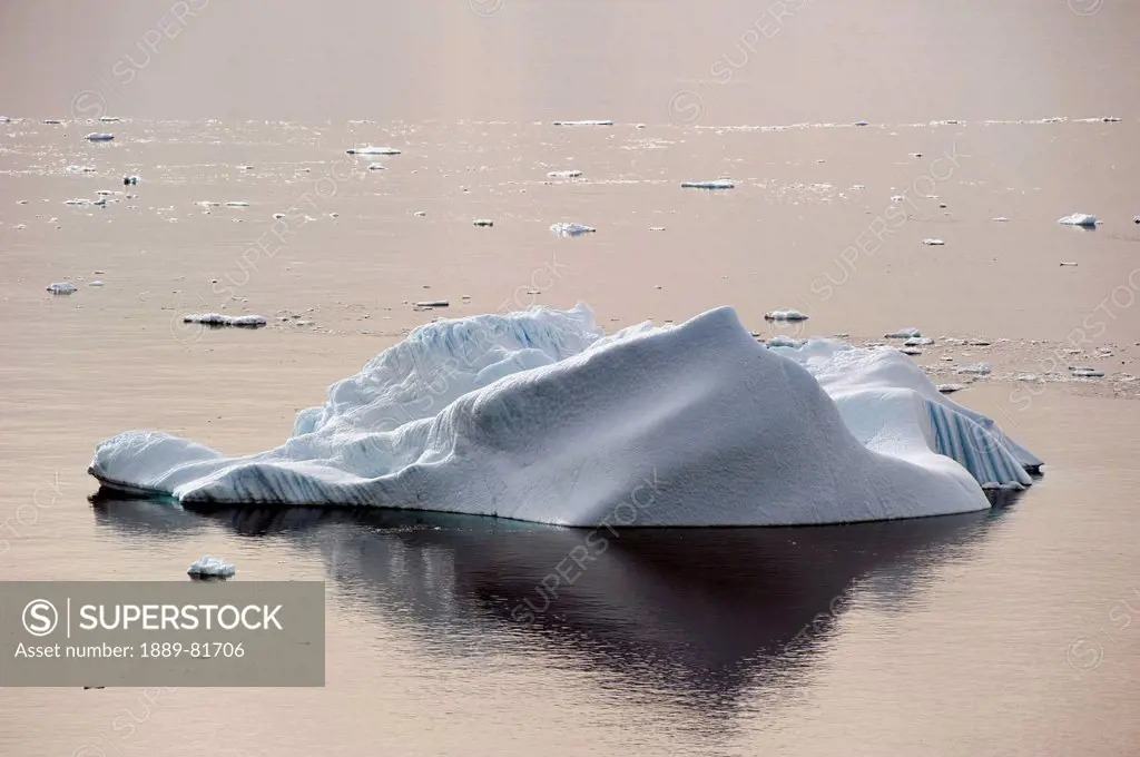 Iceberg and it´s reflection in the water, antarctica