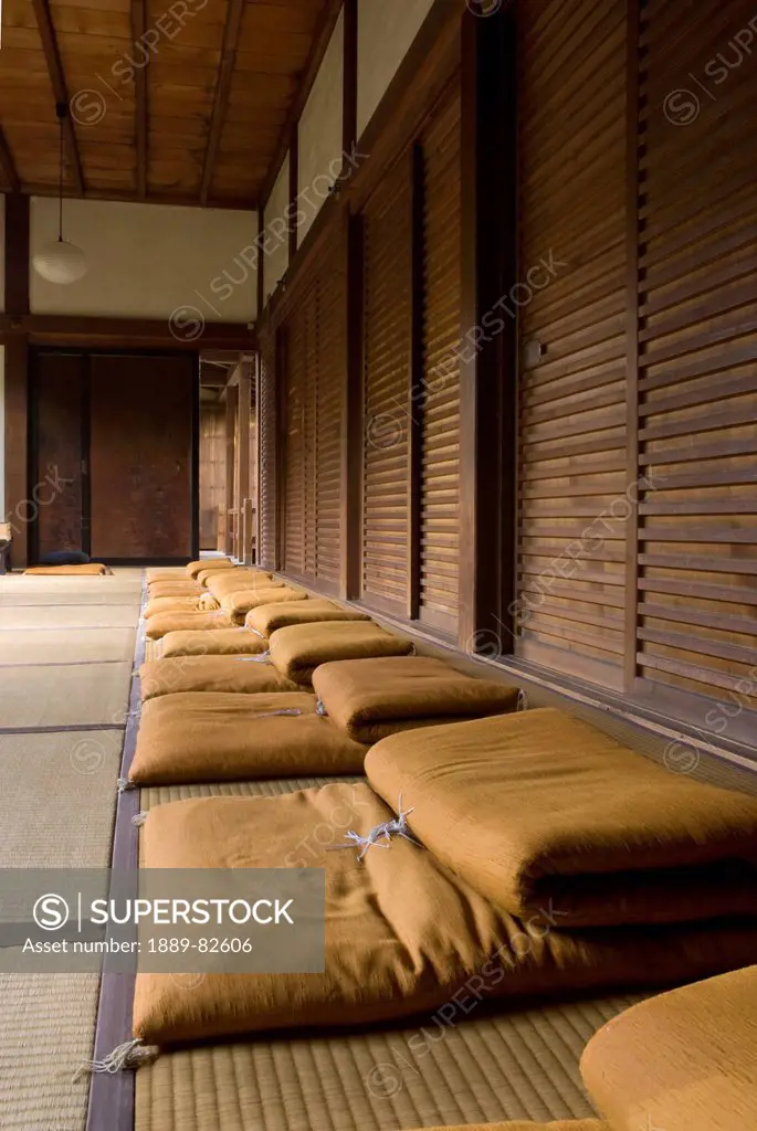 Row of meditation cushions in a japanese temple, kyoto, japan