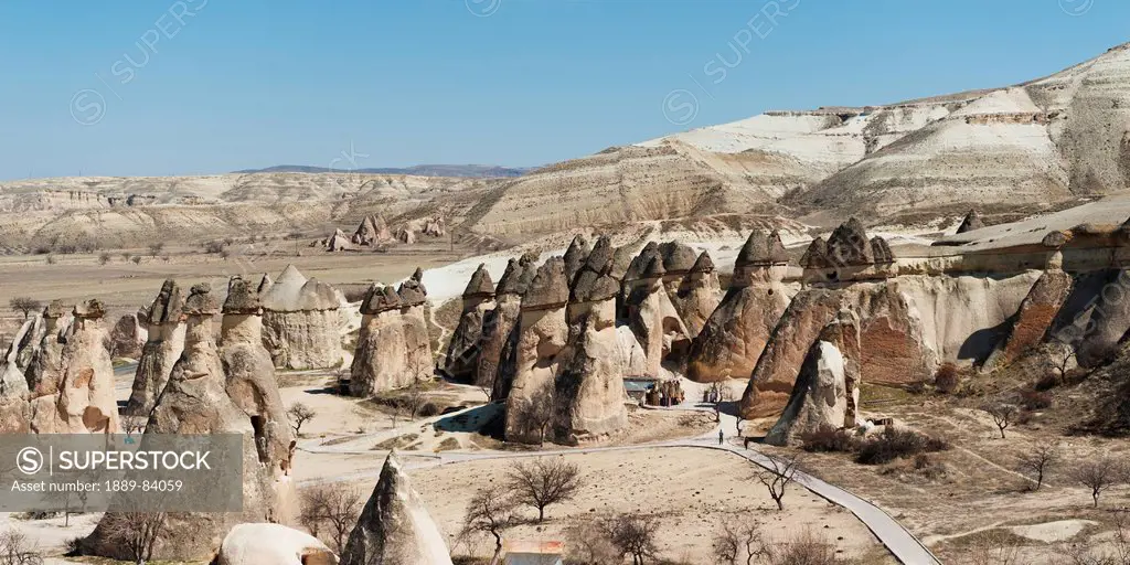 Rock Formations On A Landscape And A Blue Sky, Nevsehir Turkey