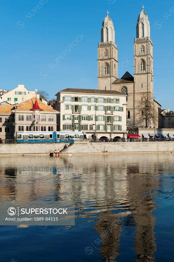 Buildings Along The Water´s Edge Reflected In The Water, Zurich Switzerland