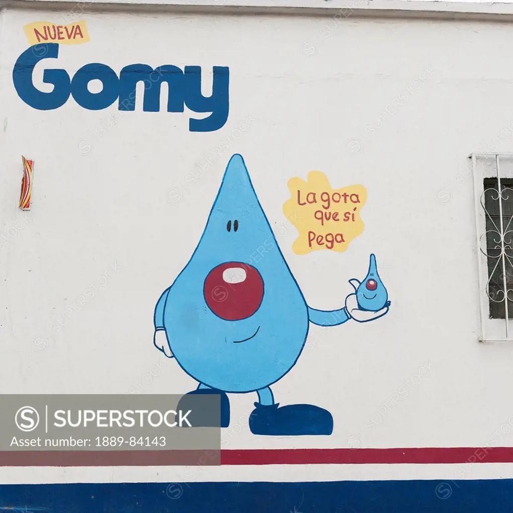 A Building With A Blue Water Drop With A Face Painted On The Wall With The Sign Saying Gomy, Guatemala City Guatemala