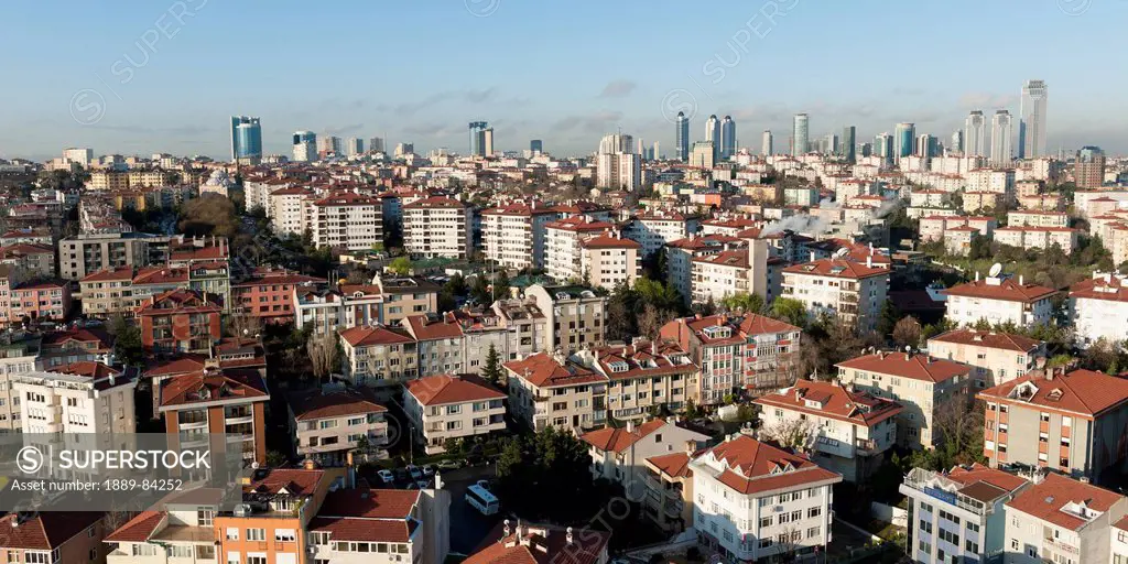 Cityscape Of Residential Buildings And Skyscrapers Against A Blue Sky, Istanbul Turkey