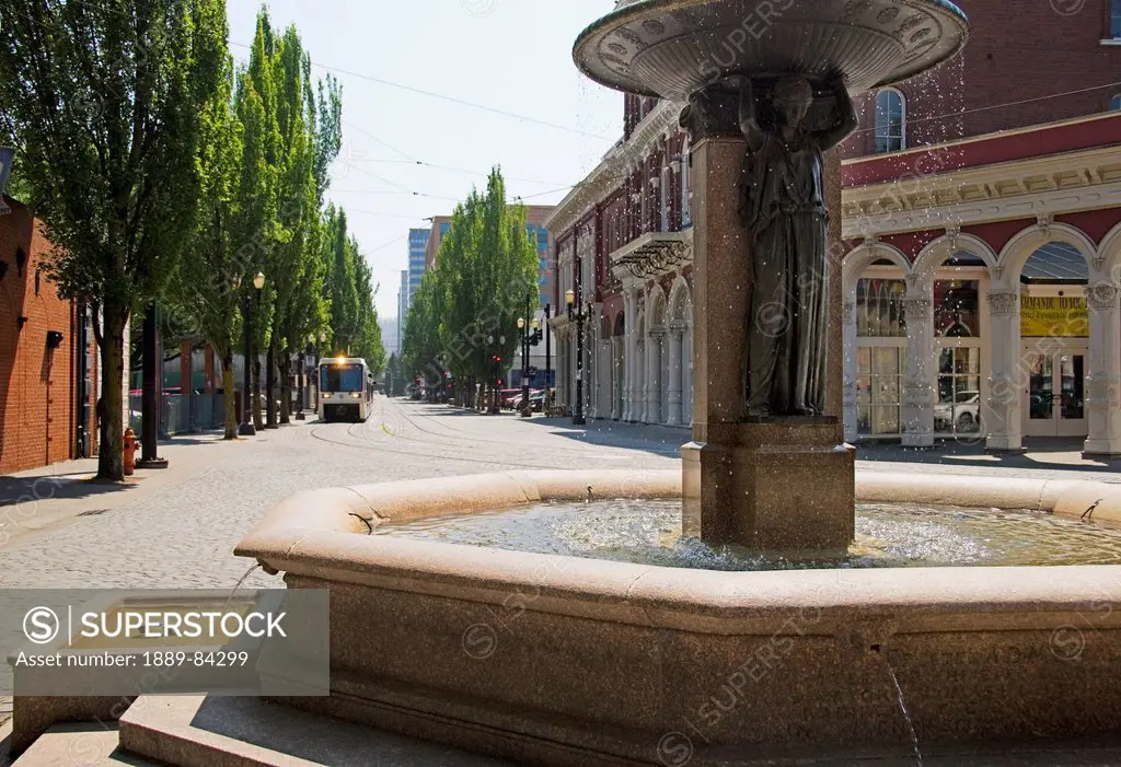 Water Fountain And Streetcar In Downtown Portland, Portland Oregon United States Of America
