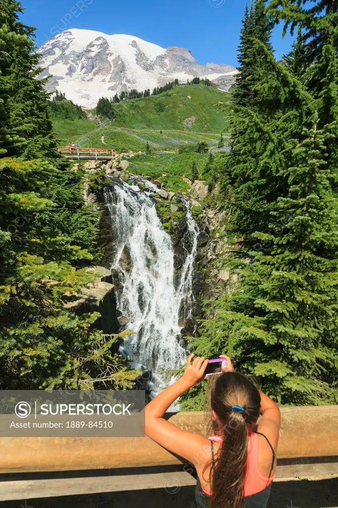 Girl Taking Photo On Smart Phone Paradise Trail Near Mount Rainier Lodge Mount Rainier National Park, Washington United States Of America